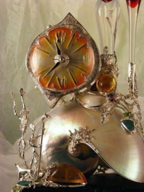 Gregory Pyra Piro Clock Sculpture in Oakwood, Sterling Silver, 14 Karat Gold, and Enamel with Nautilus Shell, Drusy, Amber, Facet Cut Garnet, Facet Cut Peridot, and Pearls