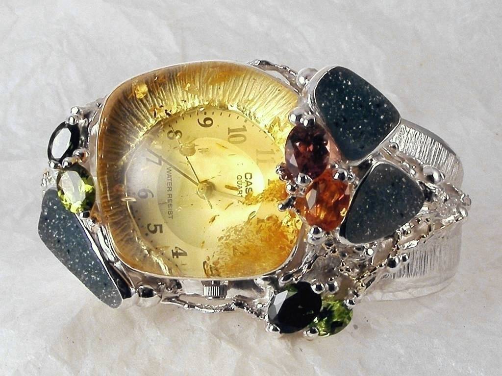 gregory pyra piro zegarek bransoleta piro 8394, oryginał autora unikat, bransolta zegarek, biżuteria ze srebra i złota mieszanych metali, bransoleta z bursztynem i granatem, bransoleta z granatem i cytrynem, bransoleta z zielonym turmalinem, bransoleta z oliwinem i bursztynem, bransoleta z kryształem druzą