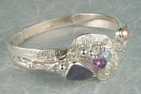 jewelry shown in international jewelry fairs and and exhibitions, bracelet handcrafted and made by artist, bracelets sold in art and craft galleries, mixed metal handcrafted jewelry, bracelet made from silver and gold, gregory pyra piro handcrafted bracelet 9535
