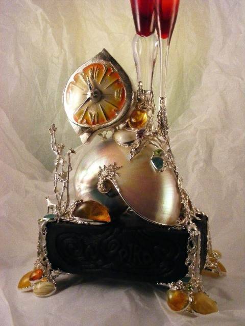 Gregory Pyra Piro Art Jewellery Clock Sculpture in sterling silver, 18 karat gold, ebony wood, enamel, nautilus shell, amber, drusy, facet peridot, facet garnet, facet amethyst, and pearls