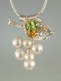 artisan made handcrafted jewelry,, jewellery with colour stones, jewellery with natural gemstones, jewellery with real pearls, where to buy jewellery for mature womens, jewellery from mixed metals with gemstones, facet cut citrine and peridot pendant 3869