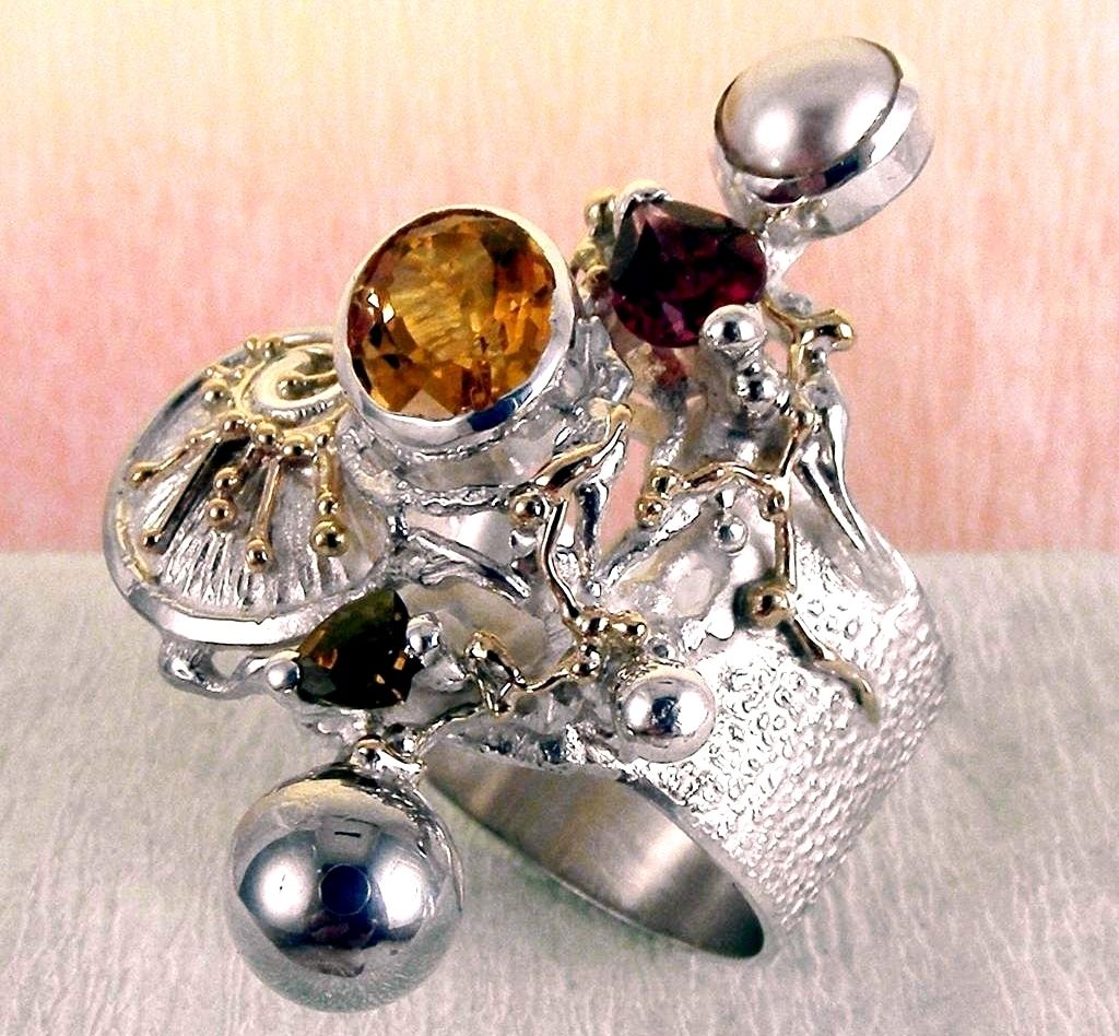 original maker's handcrafted jewellery, gregory pyra piro ring 9435, mixed metal jewelry, 14k gold and silver, sterling silver and 14 karat gold, artist with own style, unique style jewelry, silver and gemstone jewelry, gemstone and pearl jewelry, gold and color gemstone jewelry, citrine, garnet, pearl, art nouveau inspired fashion jewelry, jewellery with natural pearls and semi precious stones, contemporary jewelry from silver and gold, art jewellery with colour stones, contemporary jewelry with pearls and color stones, jewellery made from silver and gold with natural pearls and natural gemstones, shopping for diamonds and designer jewellery, accessories with color stones and pearls, artisan handcrafted jewellery with natural gemstones and natural pearls, jewelry made first hand, art and craft gallery artisan handcrafted jewellery for sale, jewellery with ocean and seashell theme
