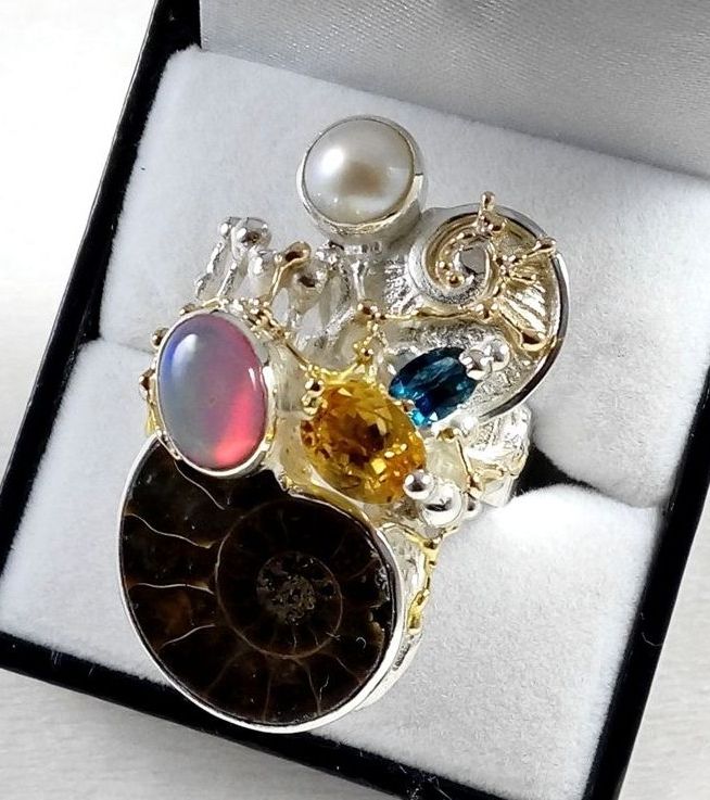 jewelry with semi precious stones, jewelry with facet cut gemstones, jewelry with natural pearls, jewelry with natural stones and pearl, Gregory Pyra Piro ring 374291, mixed metal jewellery made from gold and silver, jewelry inspired by retro fashion, auction style one of a kind jewellery made by jewellery maker, antique style handcrafted jewellery made by jewellery maker, unique design rings for women with ammonite and opal, unique design rings for women with citrine and blue topaz, unique design rings for women with ammonite and pearl, art nouveau inspired fashion jewelry, jewellery with natural pearls and semi precious stones, contemporary jewelry from silver and gold, art jewellery with colour stones, contemporary jewelry with pearls and color stones, jewellery made from silver and gold with natural pearls and natural gemstones, shopping for diamonds and designer jewellery, accessories with color stones and pearls, artisan handcrafted jewellery with natural gemstones and natural pearls, jewelry made first hand, art and craft gallery artisan handcrafted jewellery for sale, jewellery with ocean and seashell theme