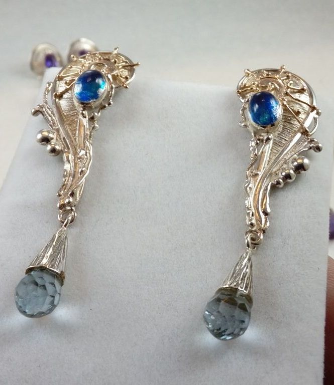 fine craft gallery earrings for sale, fine craft gallery artisan jewellery for sale, gregory pyra piro handcrafted earrings 8321, silver and gold earrings with moonstone and blue topaz, reticulated and soldered jewellery with faceted gemstones, silver and gold reticulated jewellery