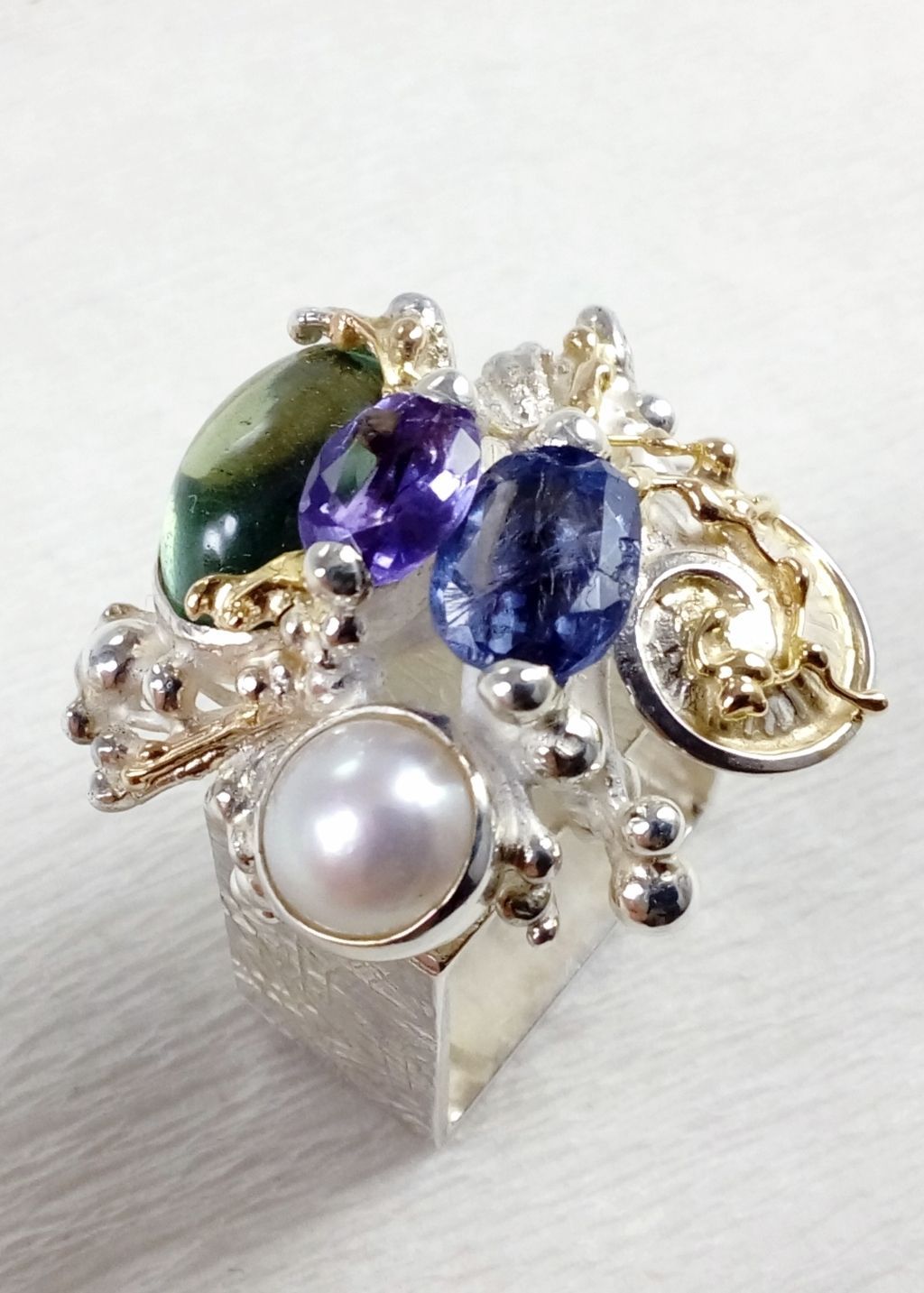jewelry made from gold and silver, jewelry with color stones, jewelry with real pearls, gregory pyra piro square ring 4821, fine craft gallery handcrafted ring for sale, sterling silver and 14 karat gold ring, rings for women with amethyst, fluorite, iolite and pearl, one of a kind handcrafted ring, where to find auctions with fine art and designer jewellery, where to buy gregory pyra piro jewelry right now