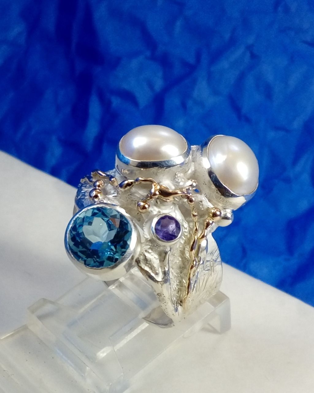 new gregory pyra piro art jewelry, specific niche artisan jewelry, Gregory Pyra Piro ring 7320, jewelry with amethyst and blue topaz together, rings for women with topaz and pearl together, rings for women with amethyst and pearl together,jewellery artist in Europe, designer jewellery sold at auctions and art galleries, where to find auctions with fine art and designer jewellery, bidding on auctions with designer jewellery, rings for women with amethyst and blutopaz, rings sold in art and craft galleries