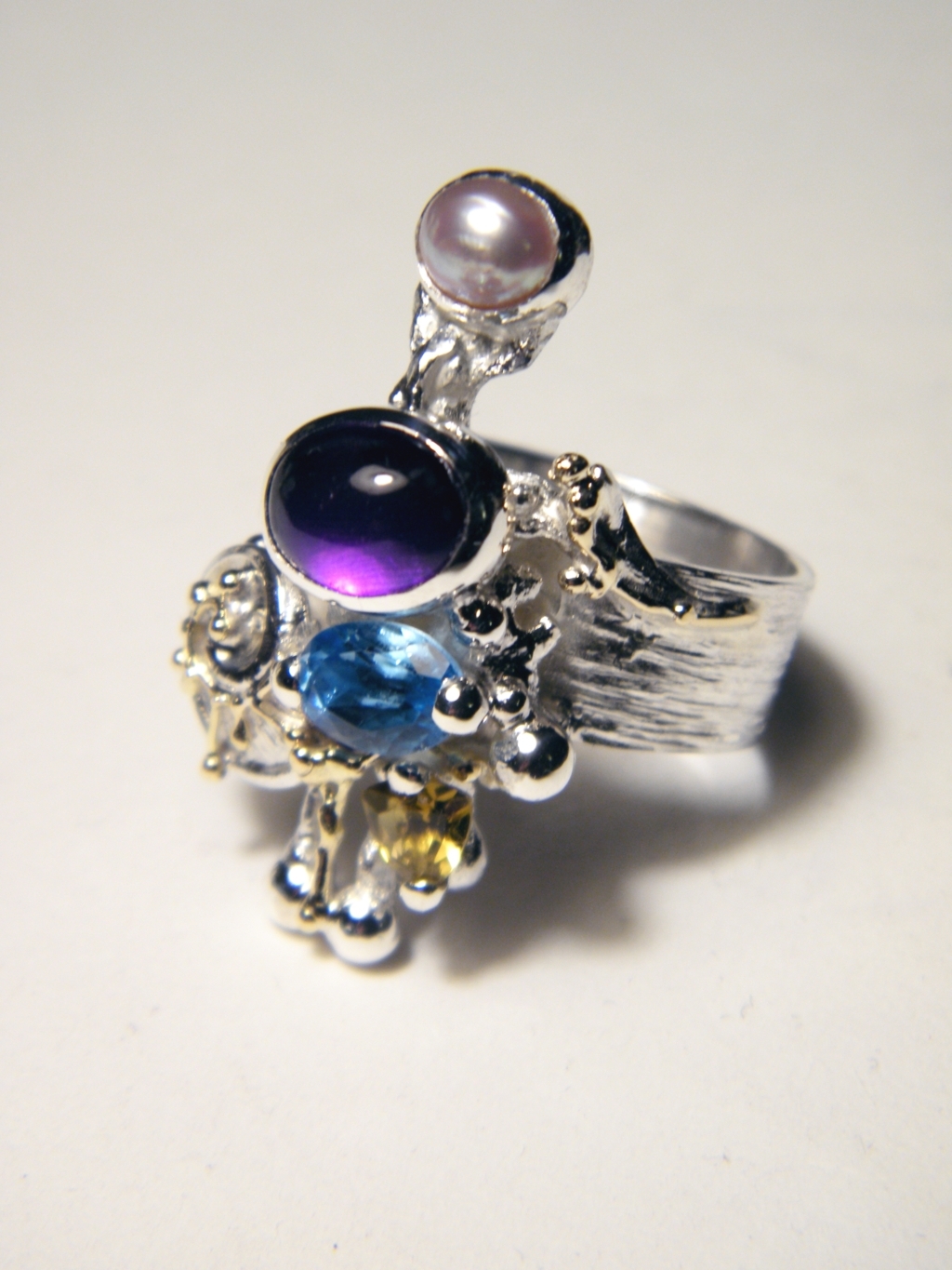 gregory pyra piro one of a kind ring 4020, mixed metal one of a kind jewellery, silver and gold mixed metal jewellery, rings for women with blue topaz and pearl, rings for women with amethyst and peridot, rings for women with blue topaz and peridot, rings for women with amethyst and blue topaz, rings in art and craft galleries