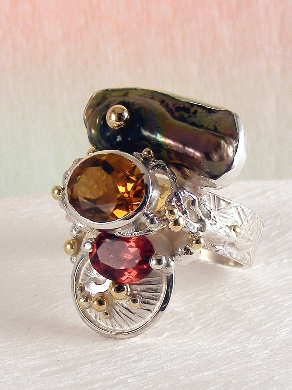 original maker's handcrafted jewellery, gregory pyra piro ring 3292, mixed metal jewelry, 14k gold and silver, sterling silver and 14 karat gold, artist with own style, unique style jewelry, silver and gemstone jewelry, gemstone and pearl jewelry, gold and color gemstone jewelry, citrine, garnet, pearl, art nouveau inspired fashion jewelry, jewellery with natural pearls and semi precious stones, contemporary jewelry from silver and gold, art jewellery with colour stones, contemporary jewelry with pearls and color stones, jewellery made from silver and gold with natural pearls and natural gemstones, shopping for diamonds and designer jewellery, accessories with color stones and pearls, artisan handcrafted jewellery with natural gemstones and natural pearls, jewelry made first hand, art and craft gallery artisan handcrafted jewellery for sale, jewellery with ocean and seashell theme